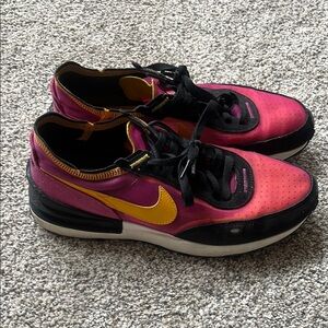 Nike Pink and Black Sneakers with Yellow Swoosh